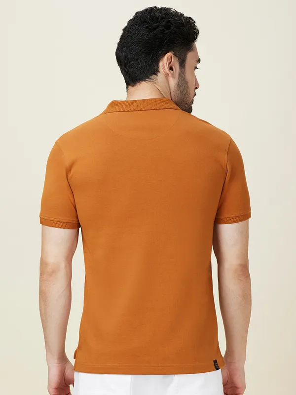 BEING HUMAN solid orange slim fit cotton polo t-shirt