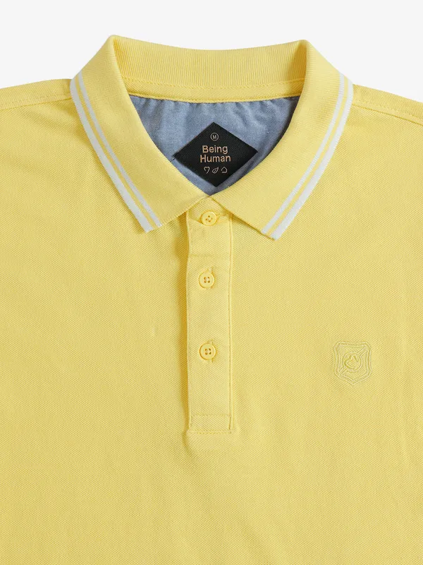 Being Human yellow polo t shirt