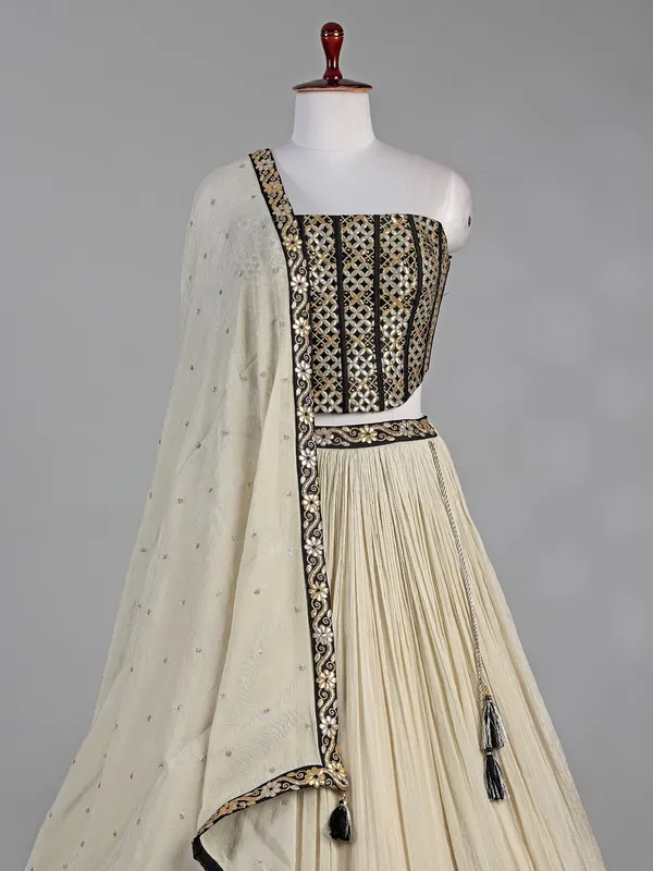 Black and cream silk lehenga choli with resham work