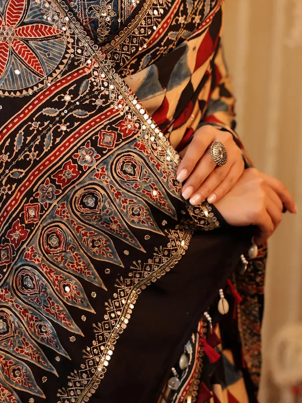 Black cotton silk printed saree for festive wear