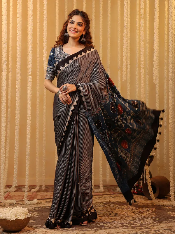 Black cotton silk printed saree with mirror work