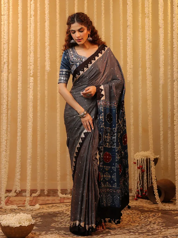 Black cotton silk printed saree with mirror work