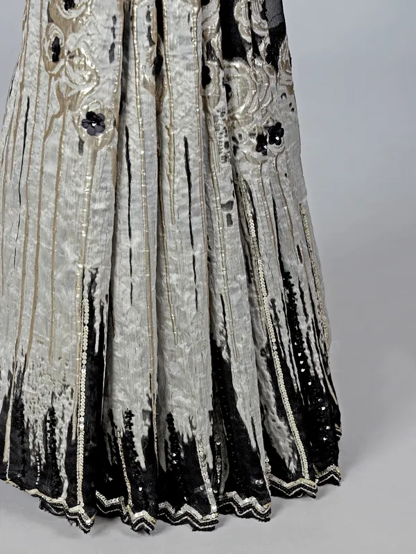 Black crepe silk saree with designer bead work
