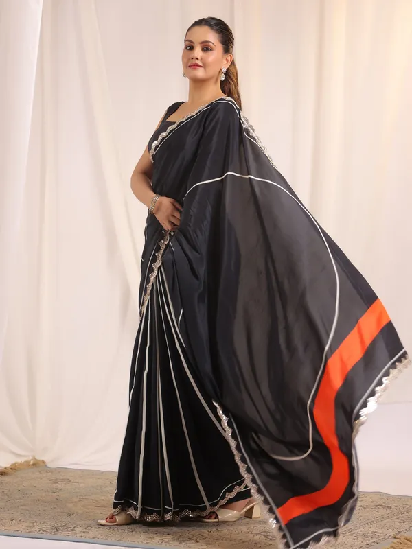 Black festive crepe silk saree with blouse