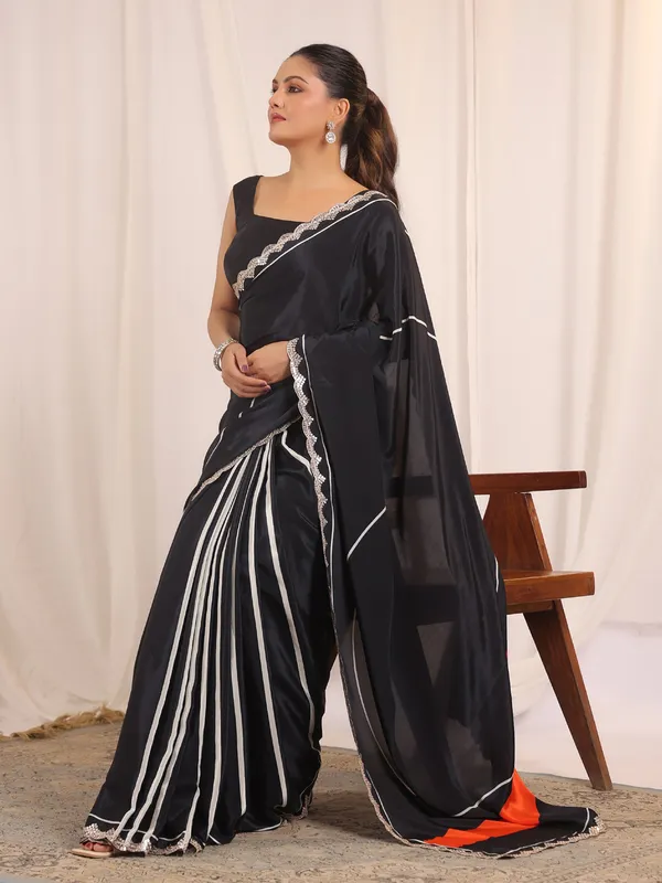 Black festive crepe silk saree with blouse