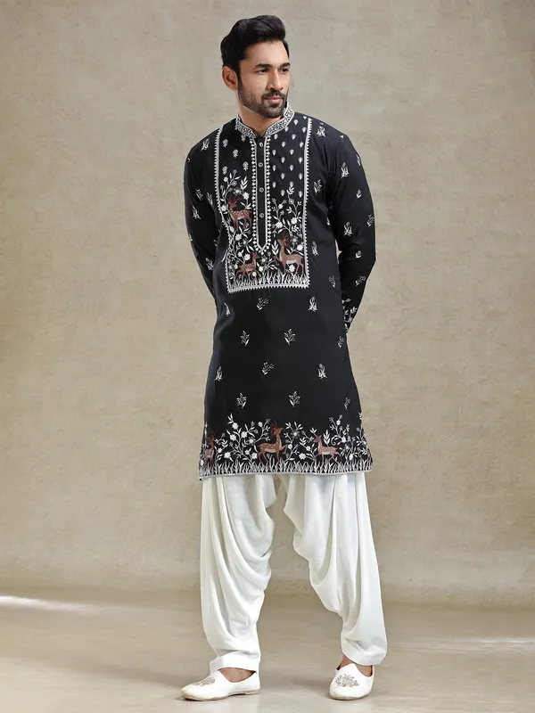 Black kurta salwar set in unique embroidery pattern