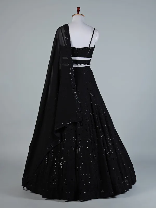 Black lehenga choli dupatta ensemble for women