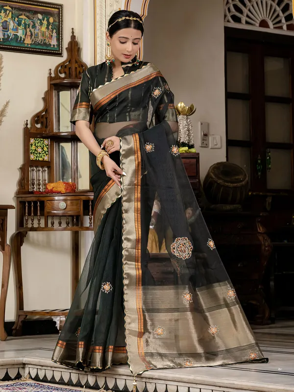 Black linen saree with traditional zari weaving