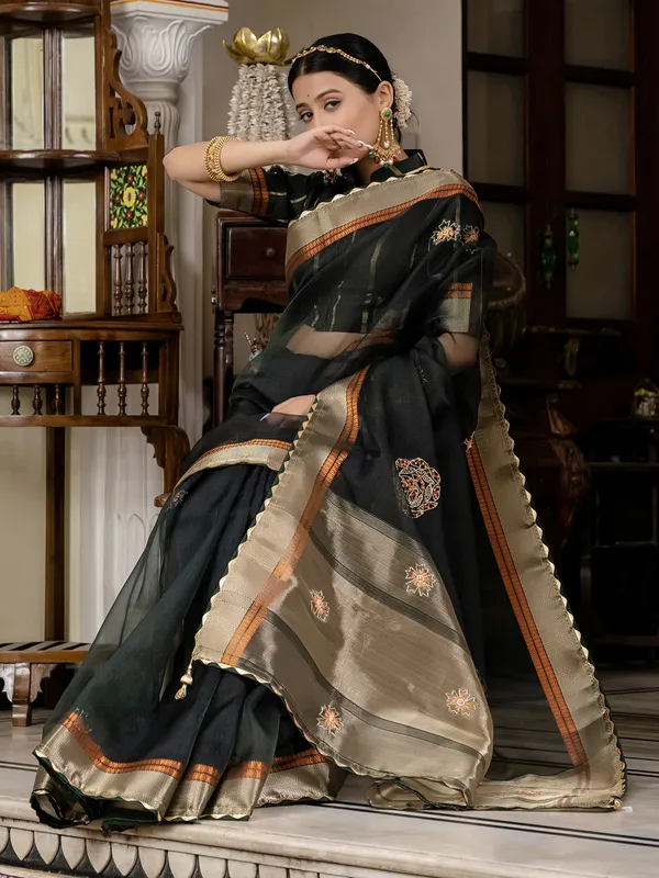 Black linen saree with traditional zari weaving