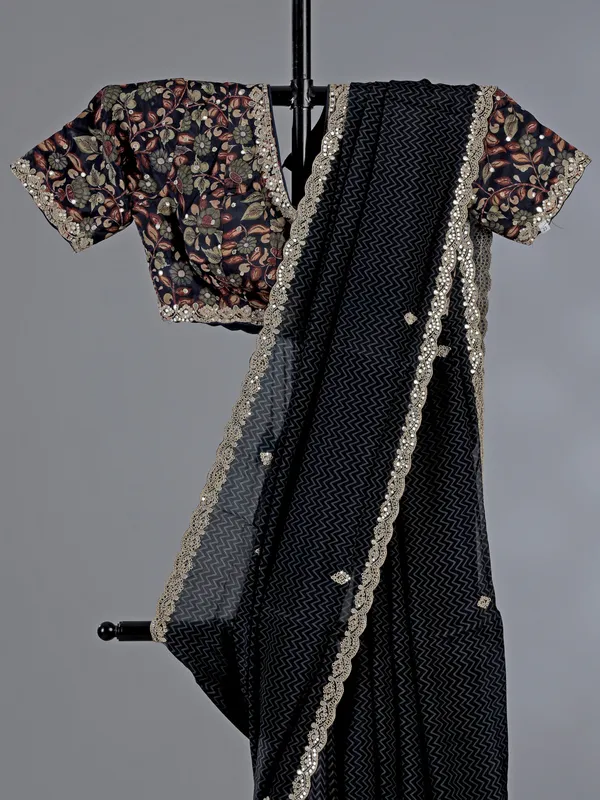 Black muslin silk printed saree with festive detailing