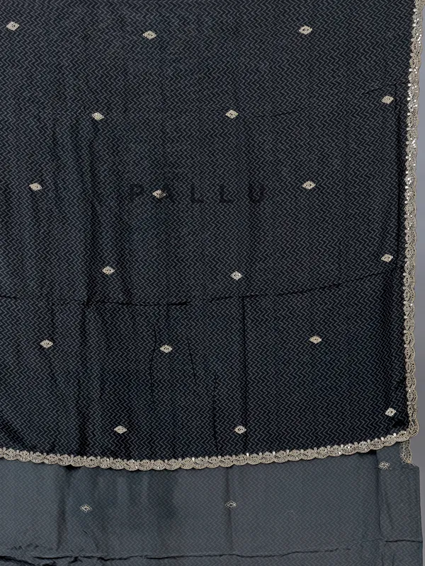 Black muslin silk printed saree with festive detailing