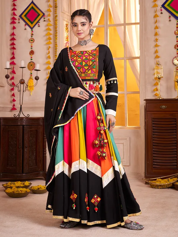 Black navratri chaniya choli with mirror and aabla work