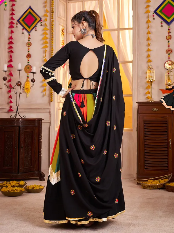 Black navratri chaniya choli with mirror and aabla work
