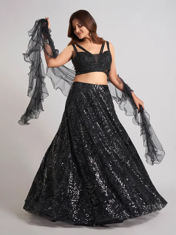 Black net designer lehenga choli with ruffle dupatta