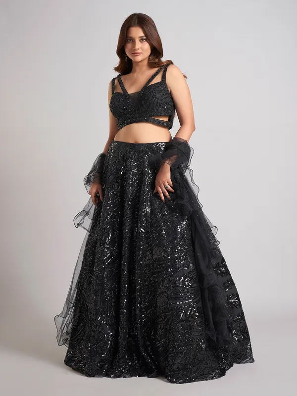Black net designer lehenga choli with ruffle dupatta