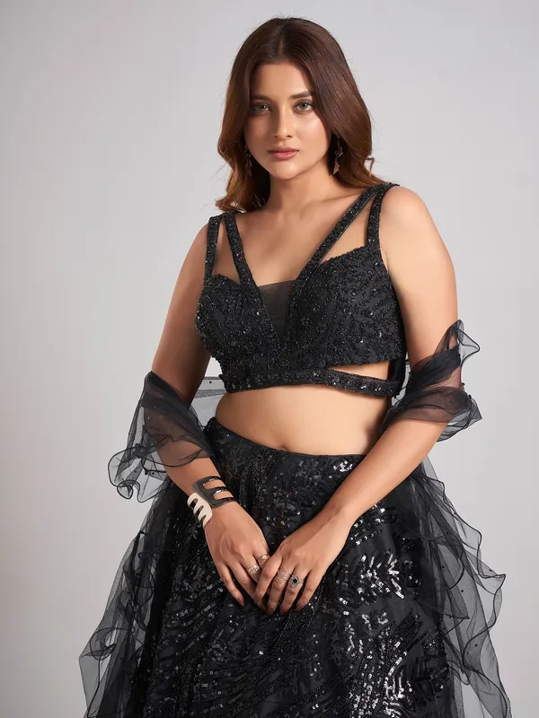 Black net designer lehenga choli with ruffle dupatta