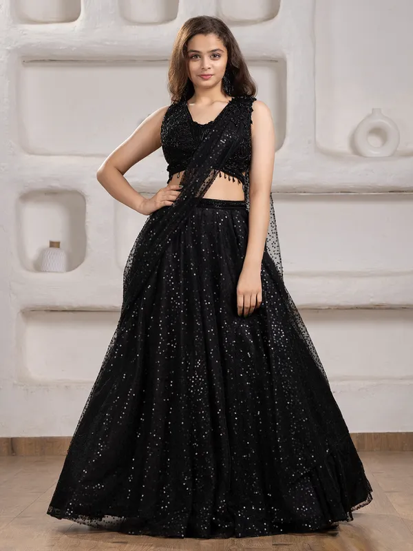 Black net lehenga choli with beads and sequins work