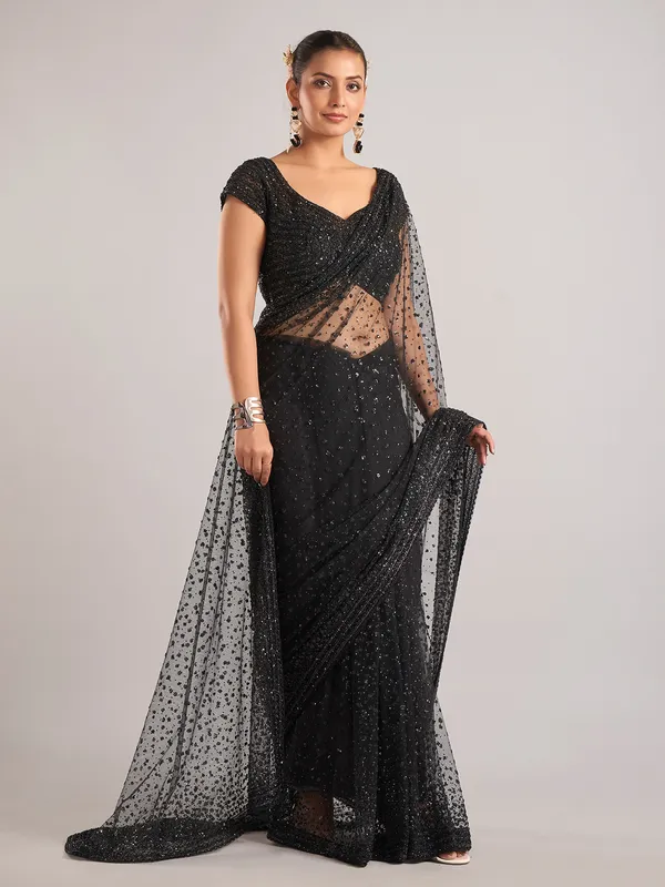 Black net saree with Cutdana Embellishments