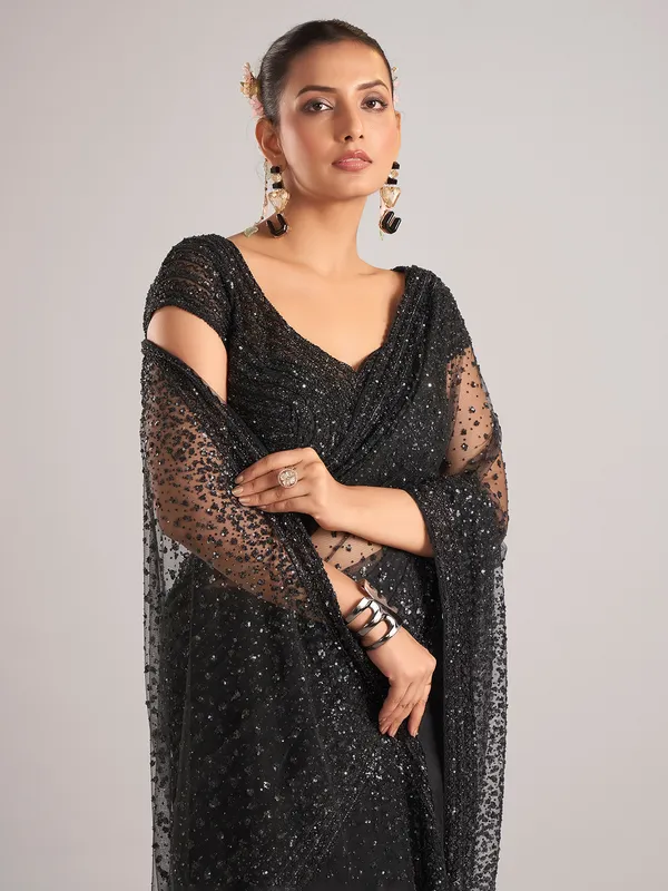 Black net saree with Cutdana Embellishments