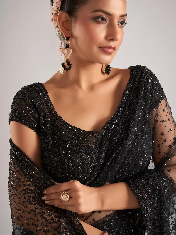 Black net saree with Cutdana Embellishments