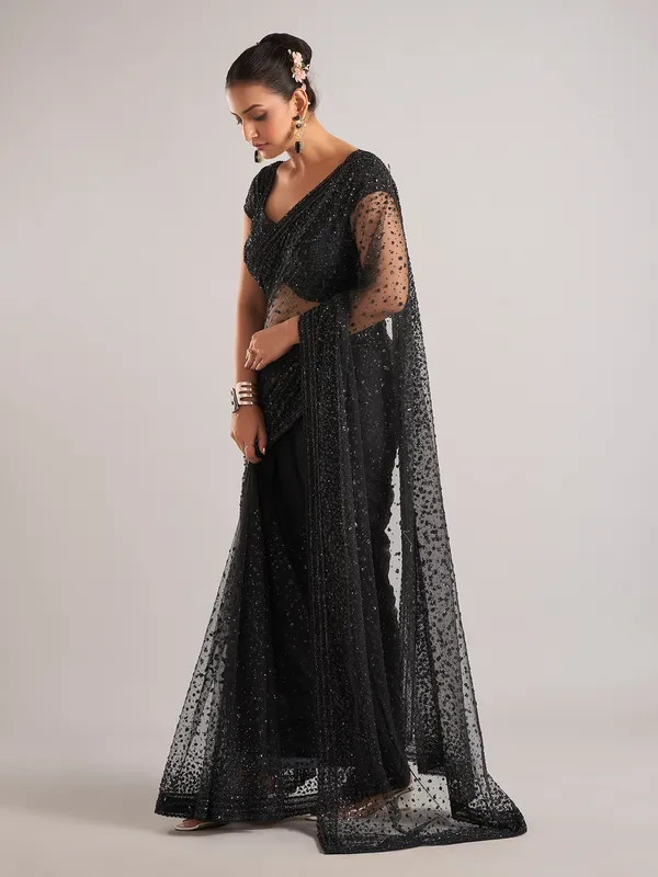 Black net saree with Cutdana Embellishments