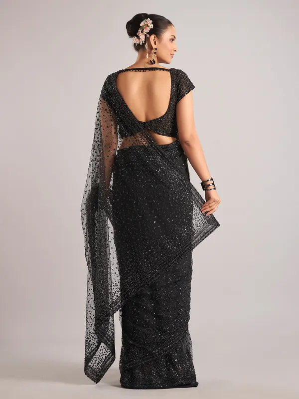 Black net saree with Cutdana Embellishments