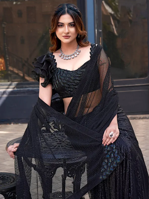 Black party saree with beads and net base