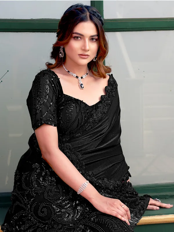 Black partywear net saree with sparkling bead finish