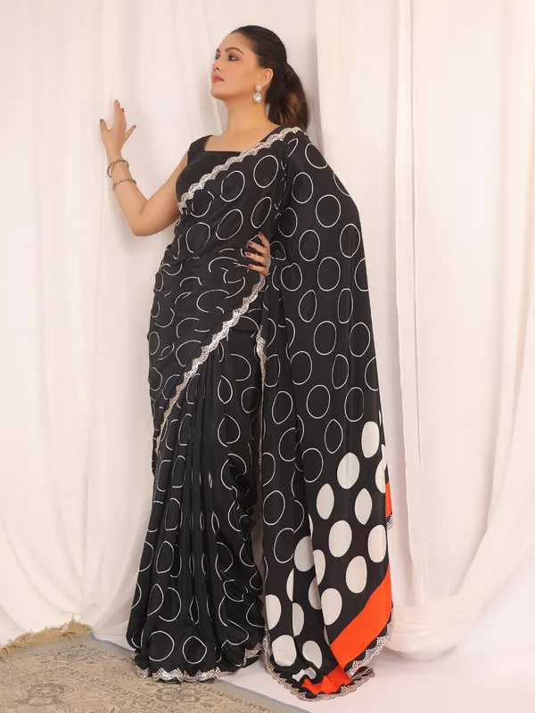 Black printed crepe silk saree with unstitched blouse