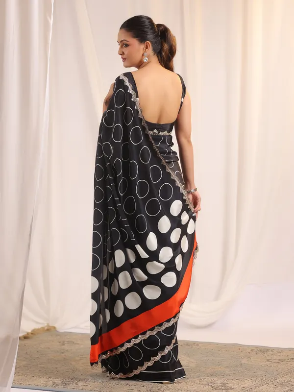 Black printed crepe silk saree with unstitched blouse