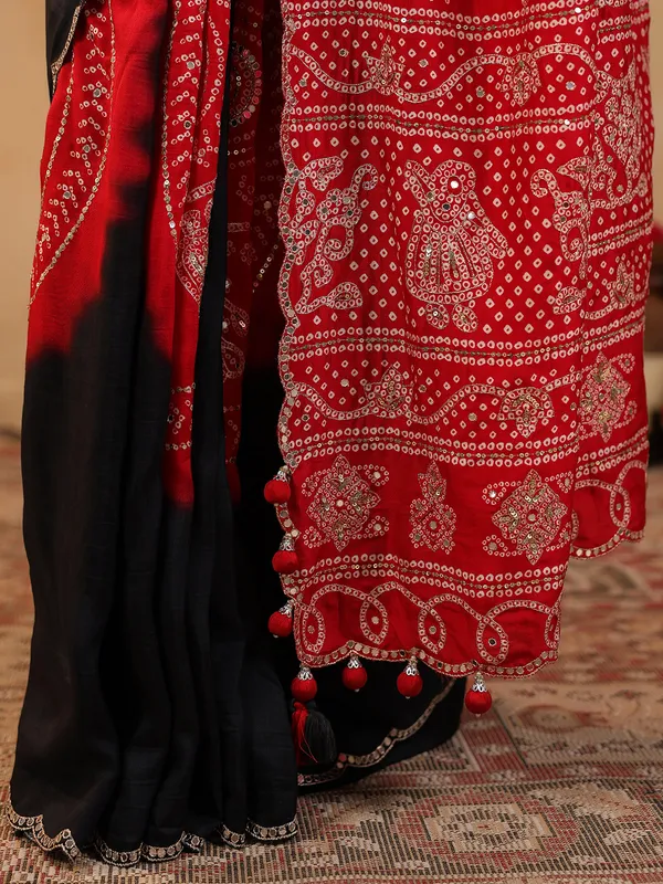 Black printed silk saree with aabla accents