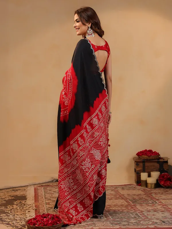 Black printed silk saree with aabla accents