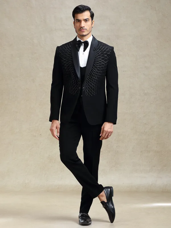 Black reception wear tuxedo suit in cutdana work