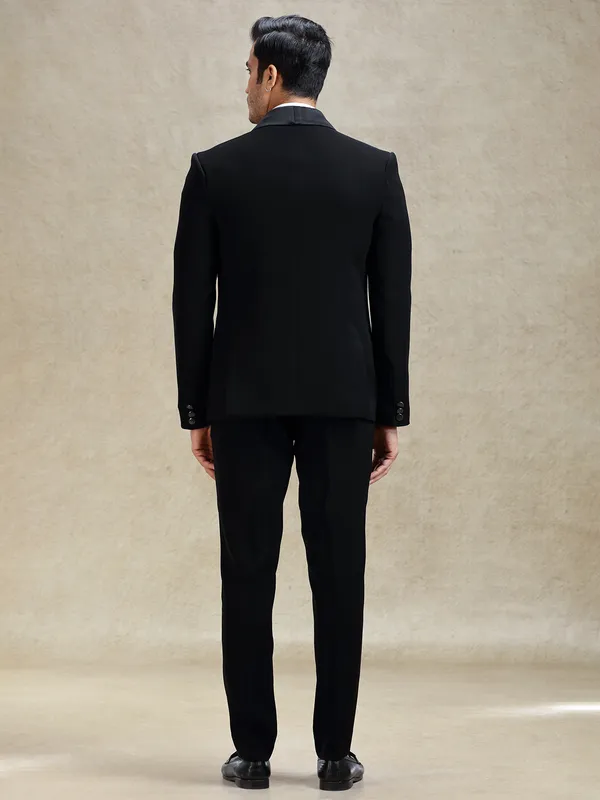 Black reception wear tuxedo suit in cutdana work