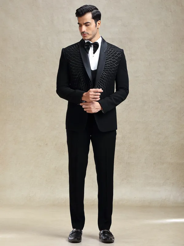 Black reception wear tuxedo suit in cutdana work