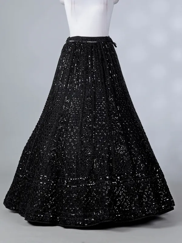 Black silk cape style cutdana lehenga choli