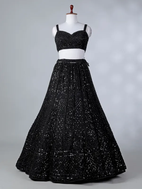 Black silk cape style cutdana lehenga choli
