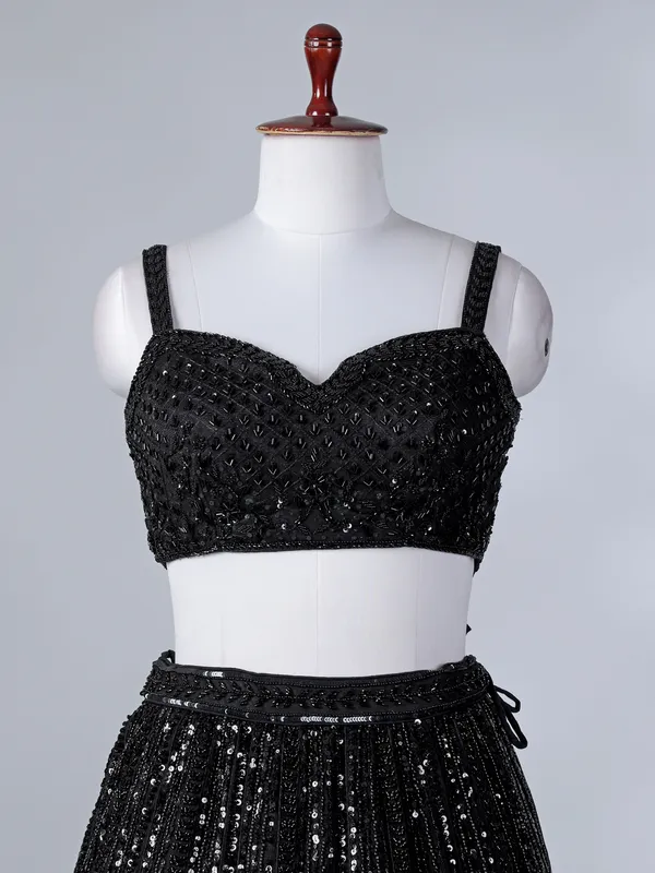 Black silk cape style cutdana lehenga choli