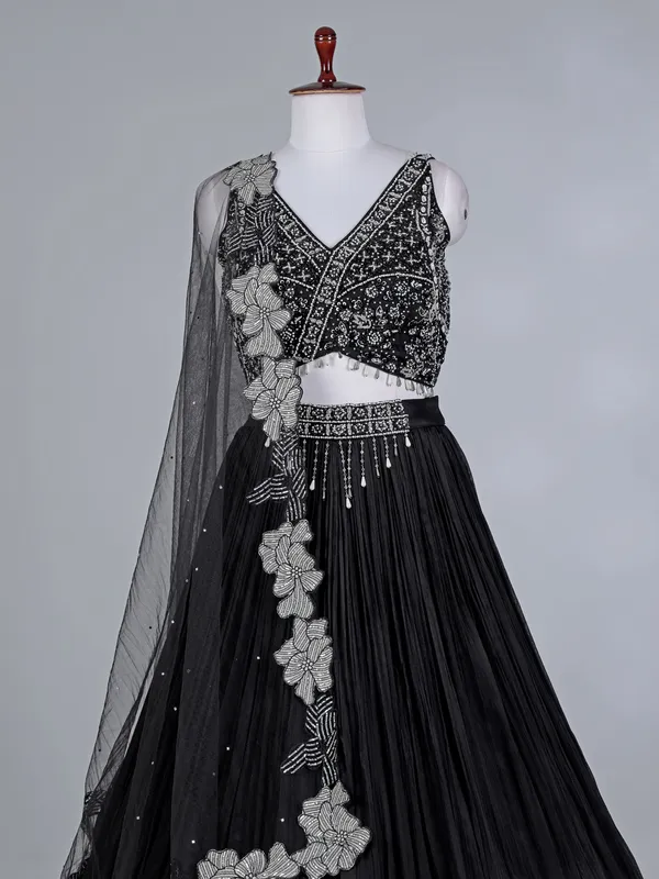Black silk lehenga choli with patchwork sparkle