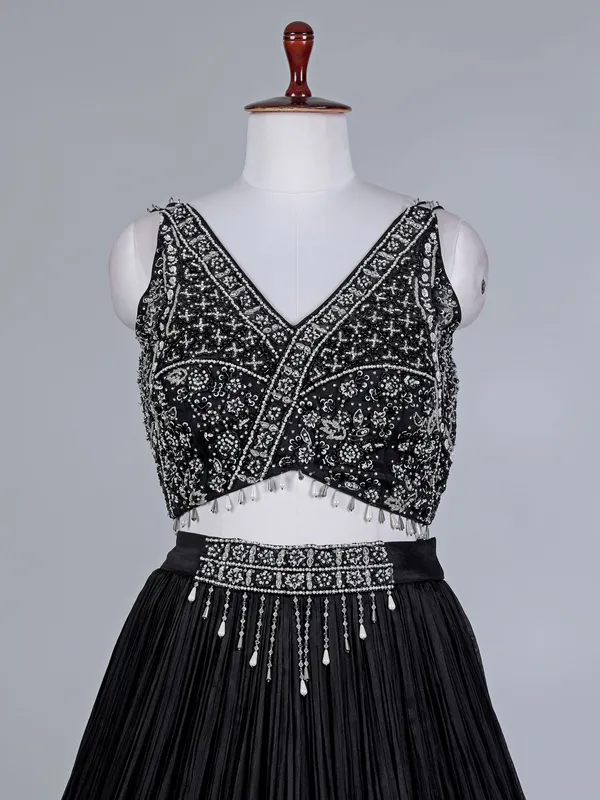 Black silk lehenga choli with patchwork sparkle