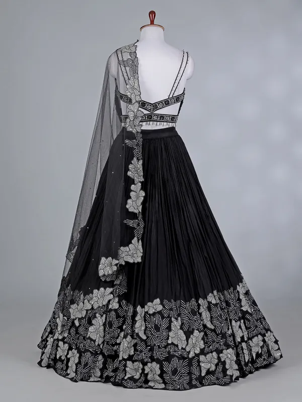 Black silk lehenga choli with patchwork sparkle