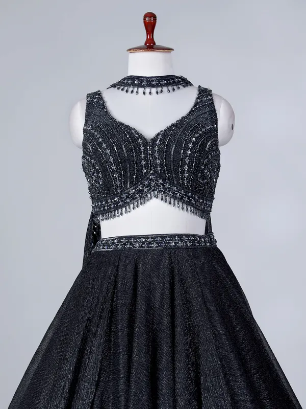 Black silk lehenga choli with zari accents