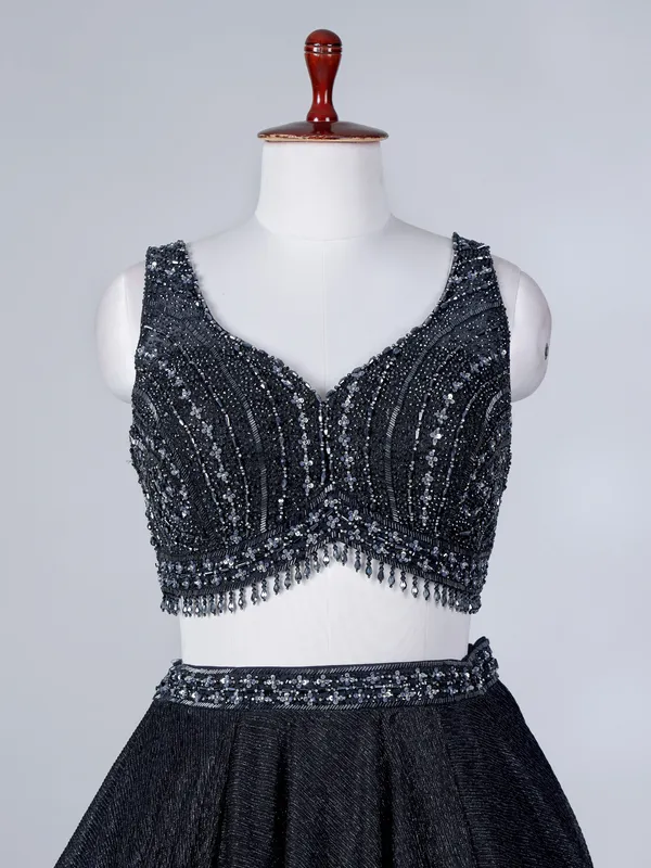 Black silk lehenga choli with zari accents