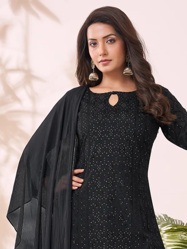 Black silk palazzo suit with keyhole neckline