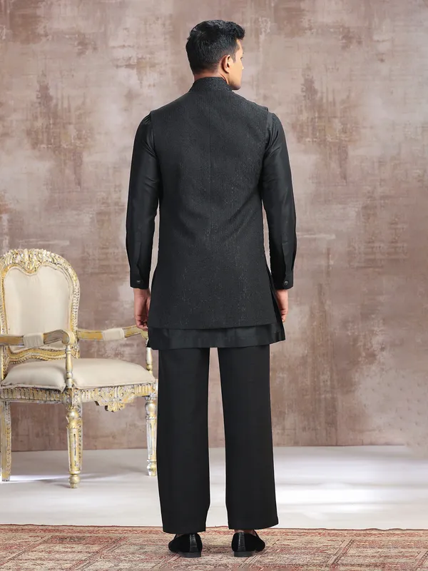 Black silk waistcoat set with thread work