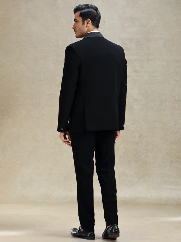 Black terry rayon tuxedo suit in crystal work