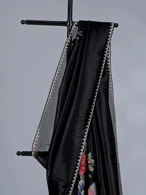 Black tissue silk saree with peacock design