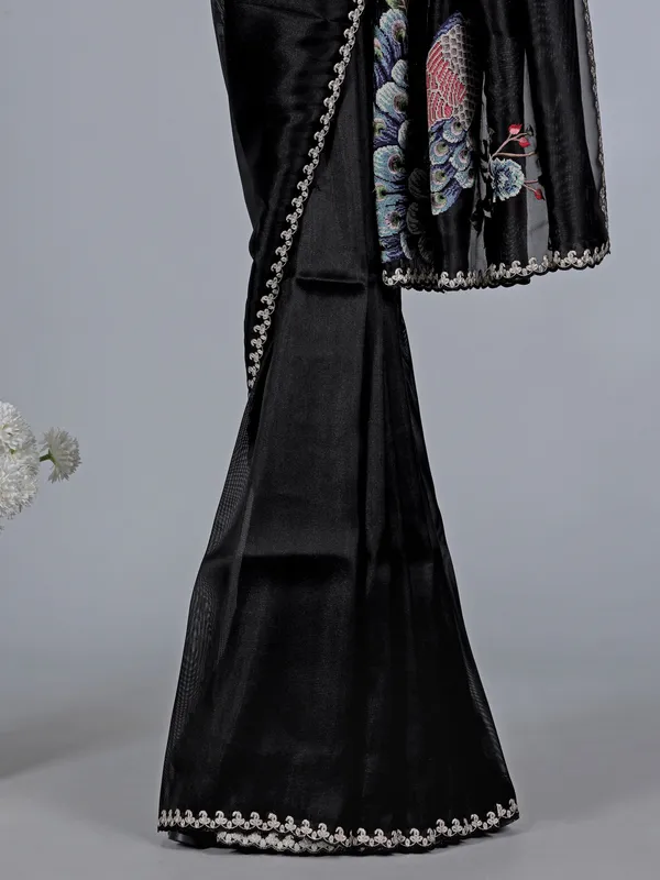 Black tissue silk saree with peacock design