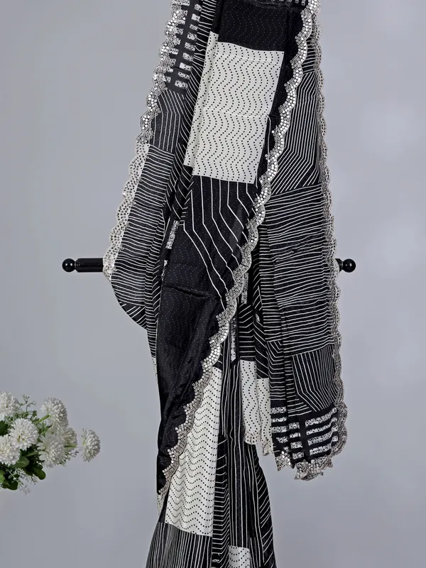 Black white crepe silk reception wear saree