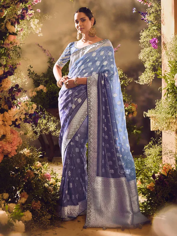 Blue banarasi tissue saree with intricate traditional work